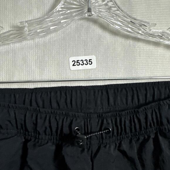 NIKE Sportswear Women's Medium Black Woven Nylon Essential Oversized Cargo Pants - Picture 8 of 15